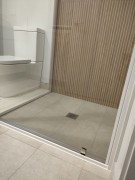 Abstract Ivory with Canne Ecru. Tiled by Elite Tiling Ltd