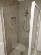 Abstract Ivory with Canne Ecru. Tiled by Elite Tiling Ltd