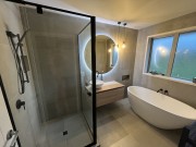 Hamilton bathroom tiled by Evolve Tiling Ltd